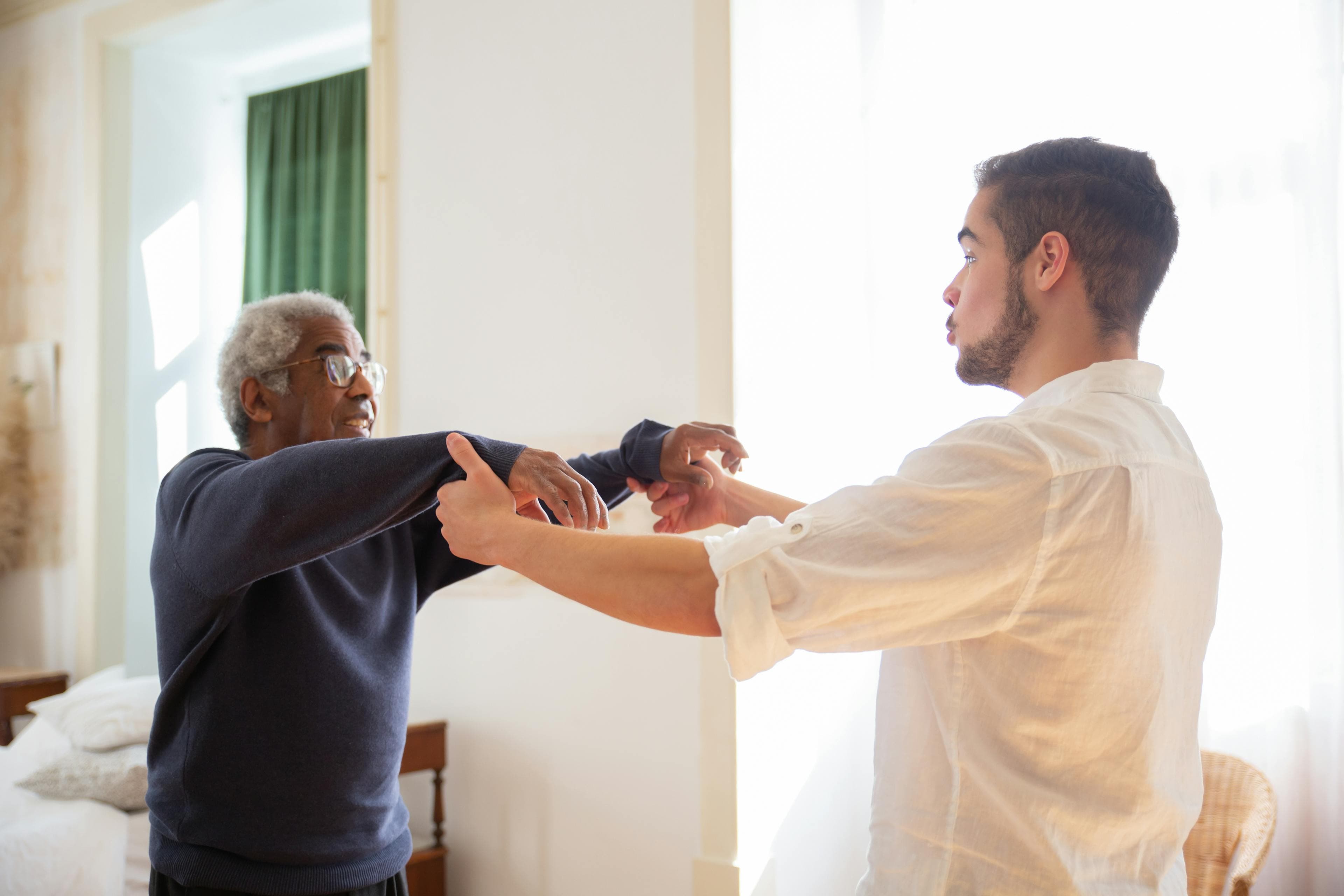 A caregiver supporting an elderly client during recovery